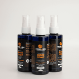 Bottles of MORE MEN Beard Tonic